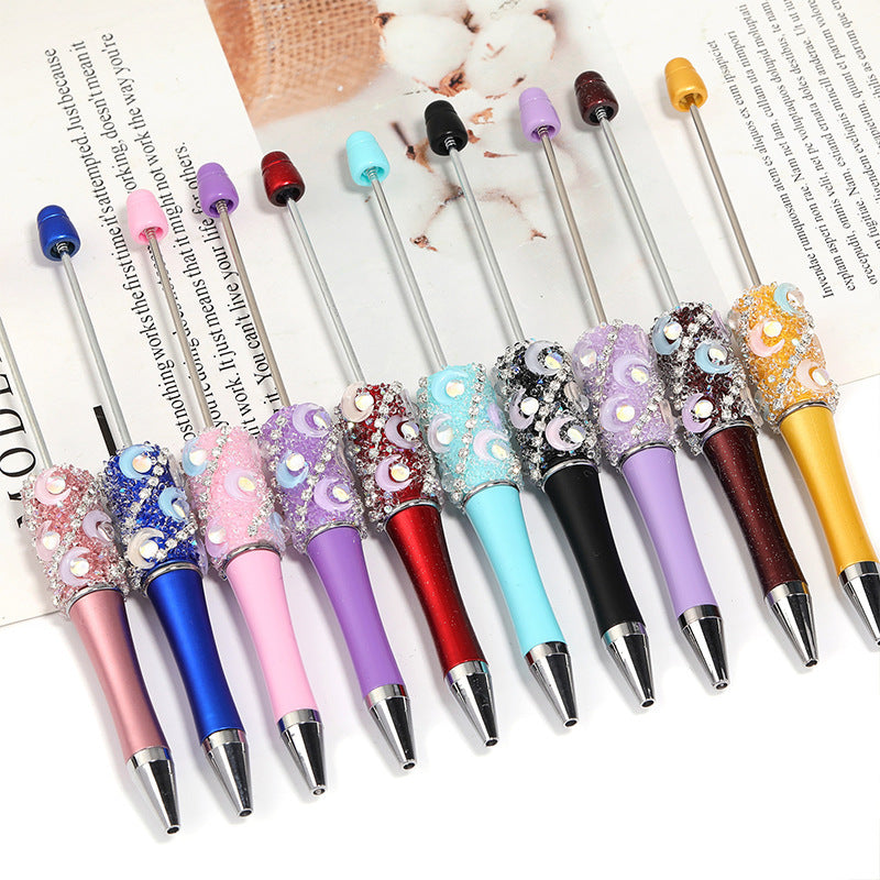 Crescent-shaped multi-colored plastic rotating ballpoint pen with refillable ink cartridge