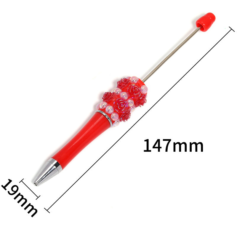 Flower-shaped rotating ballpoint pen with plastic beads