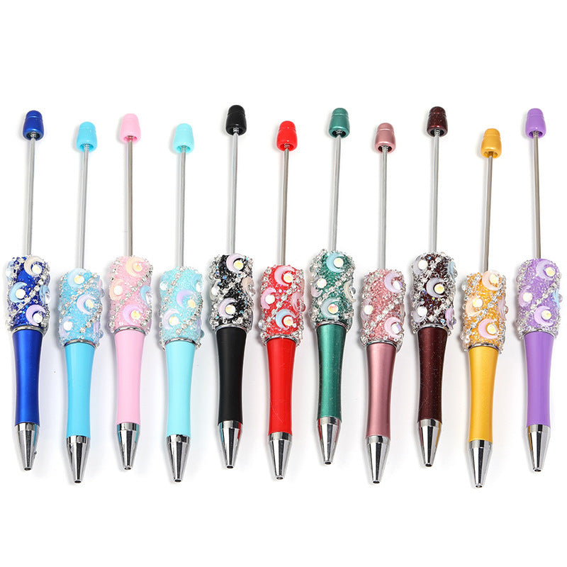 Crescent-shaped multi-colored plastic rotating ballpoint pen with refillable ink cartridge