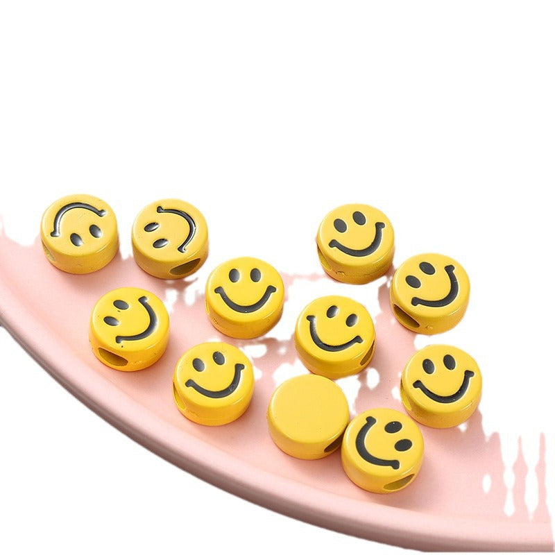 黄色のスマイリーフェイス樹脂ビーズ