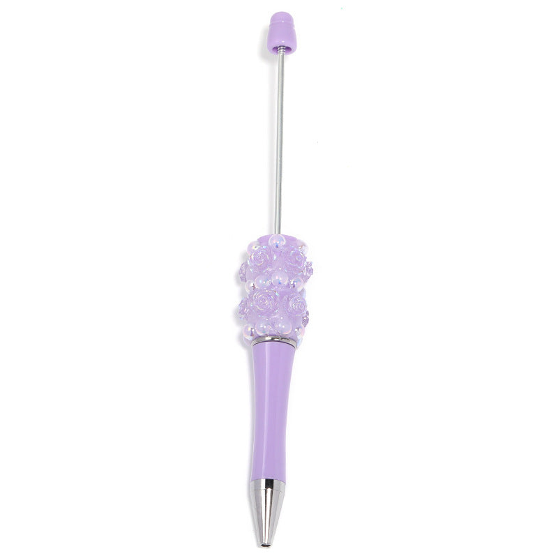 Flower-shaped rotating ballpoint pen with plastic beads