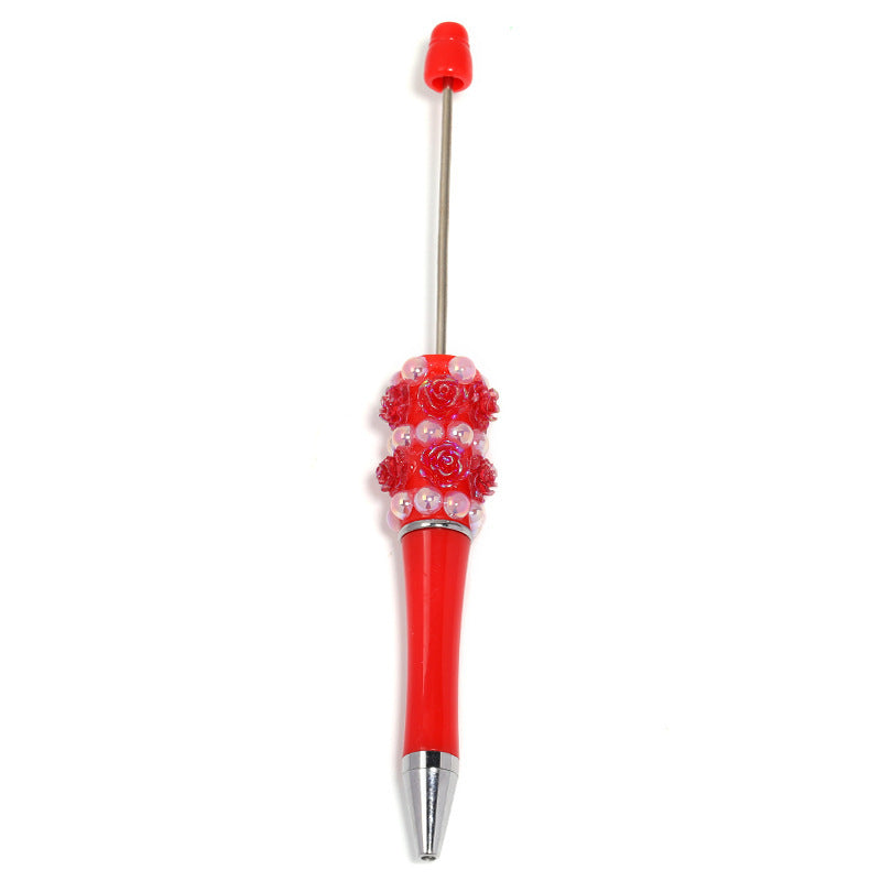 Flower-shaped rotating ballpoint pen with plastic beads