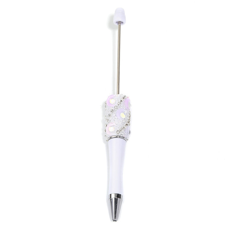 Crescent-shaped multi-colored plastic rotating ballpoint pen with refillable ink cartridge