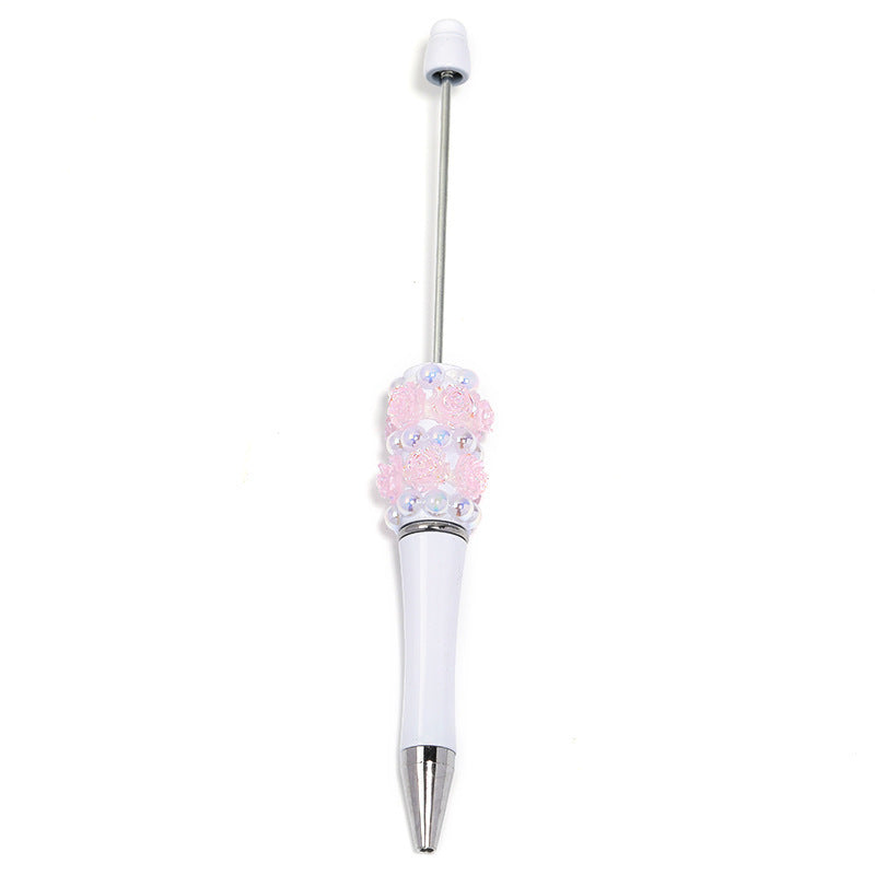 Flower-shaped rotating ballpoint pen with plastic beads