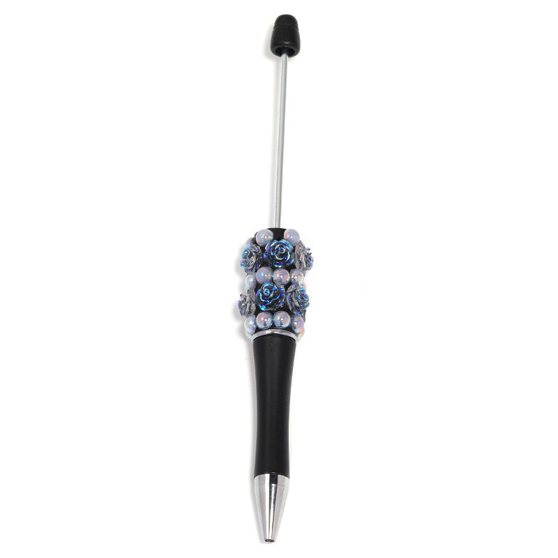 Flower-shaped rotating ballpoint pen with plastic beads