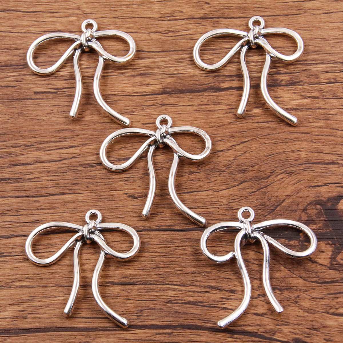 Metal Hollow Cute Bow Pendant Charms