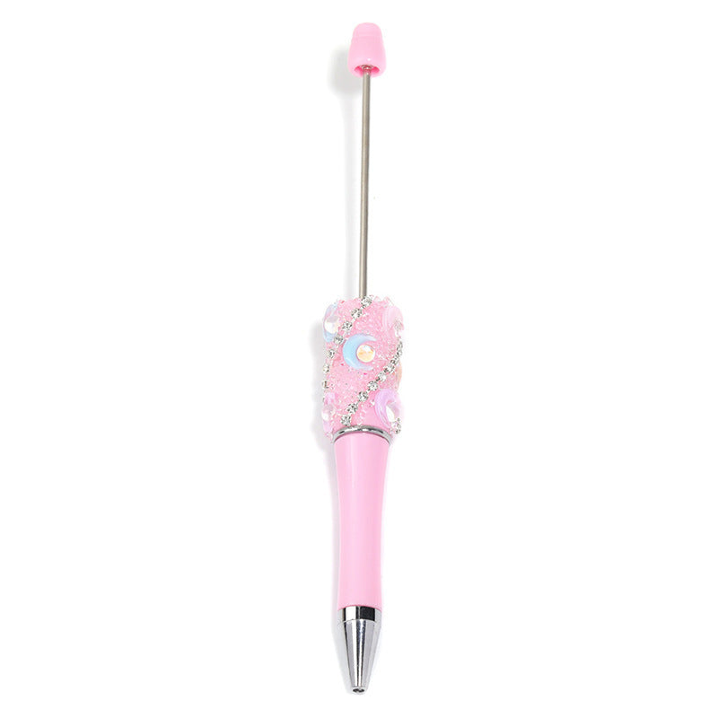 Crescent-shaped multi-colored plastic rotating ballpoint pen with refillable ink cartridge