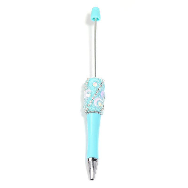 Crescent-shaped multi-colored plastic rotating ballpoint pen with refillable ink cartridge