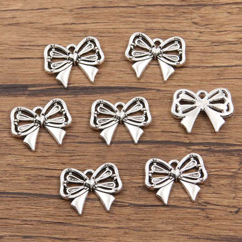 Metal Hollow Cute Bow Pendant Charms