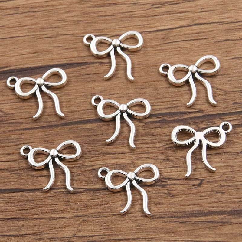 Metal Hollow Cute Bow Pendant Charms