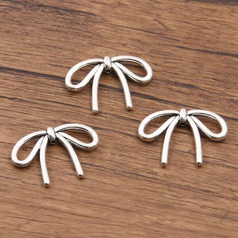 Metal Hollow Cute Bow Pendant Charms