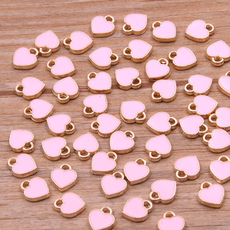10色 6*8mm ミニハートペンダント KC ゴールドドロップチャームペンダント ジュエリーバッグ ネイルアクセサリー
