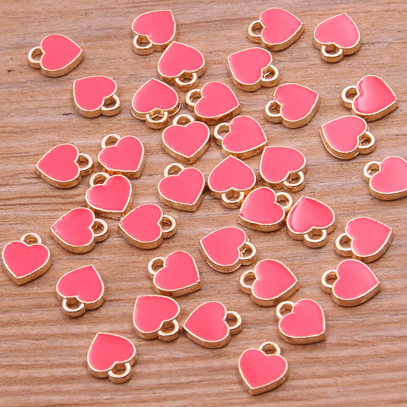 10色 6*8mm ミニハートペンダント KC ゴールドドロップチャームペンダント ジュエリーバッグ ネイルアクセサリー