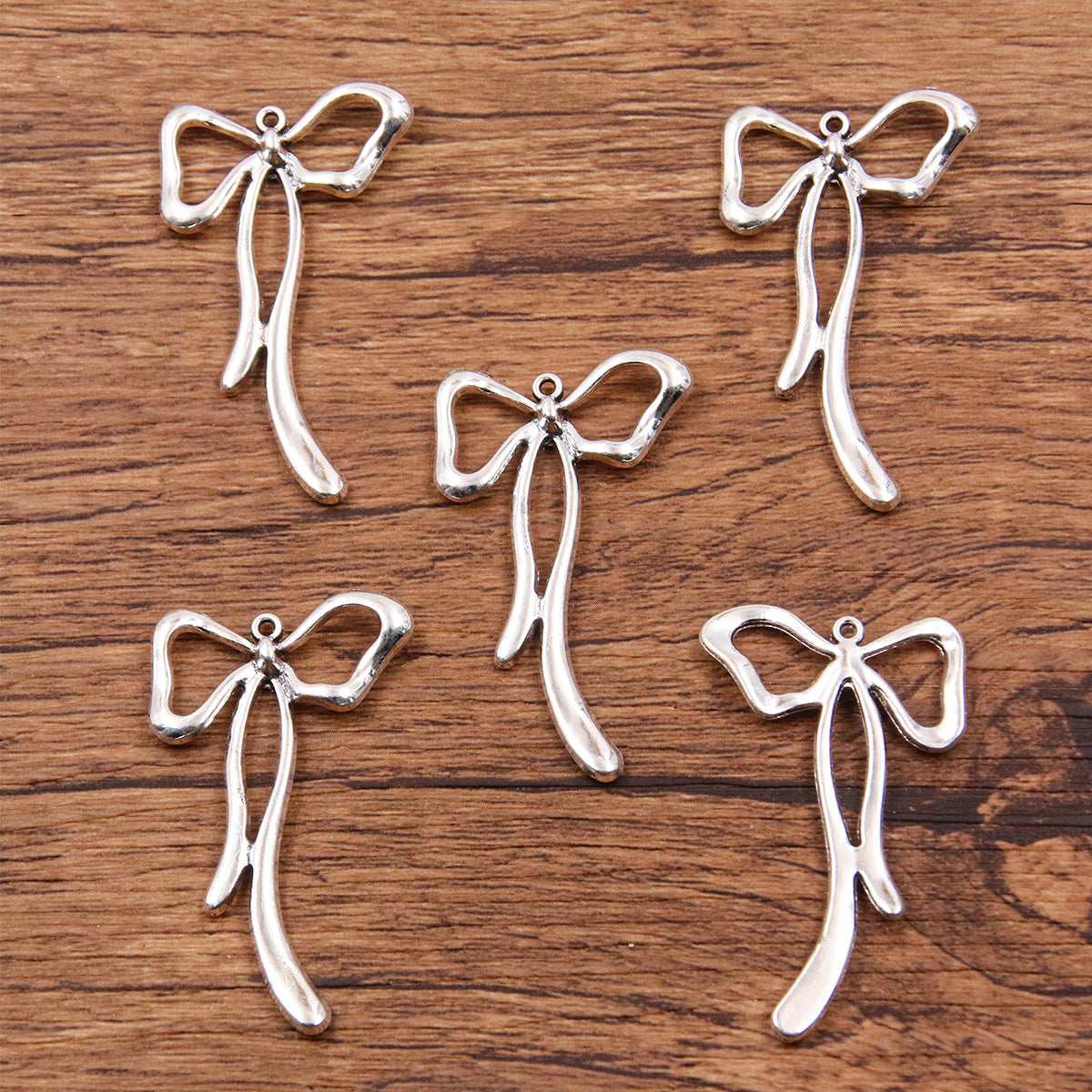 Metal Hollow Cute Bow Pendant Charms