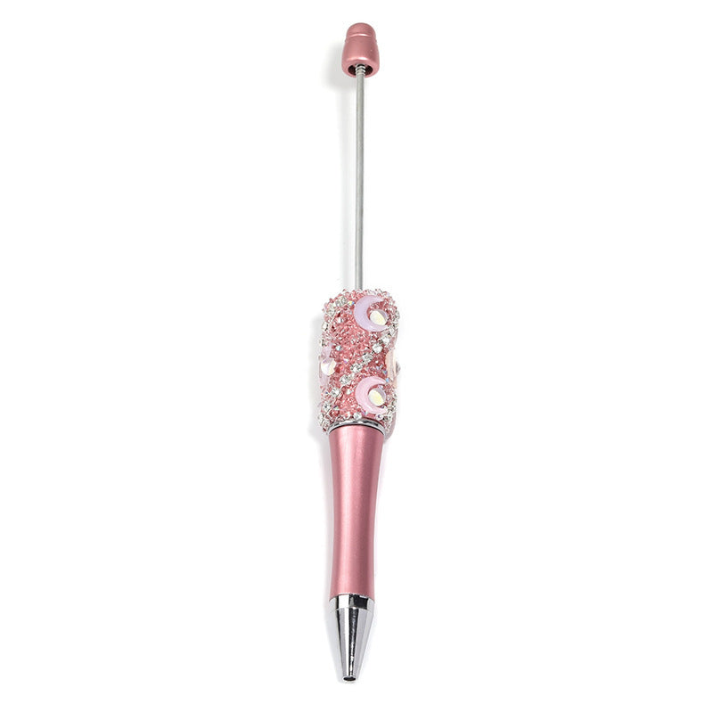 Crescent-shaped multi-colored plastic rotating ballpoint pen with refillable ink cartridge