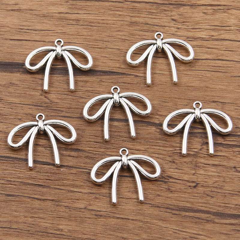 Metal Hollow Cute Bow Pendant Charms