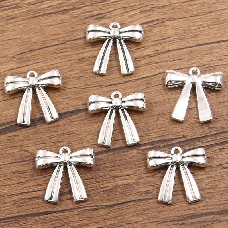 Metal Hollow Cute Bow Pendant Charms