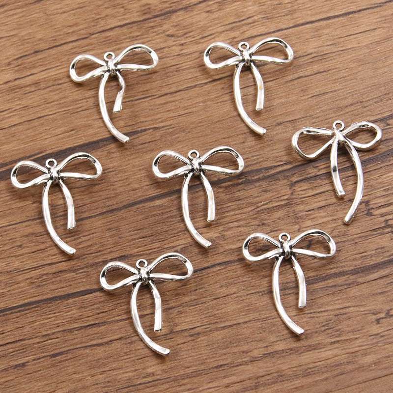 Metal Hollow Cute Bow Pendant Charms