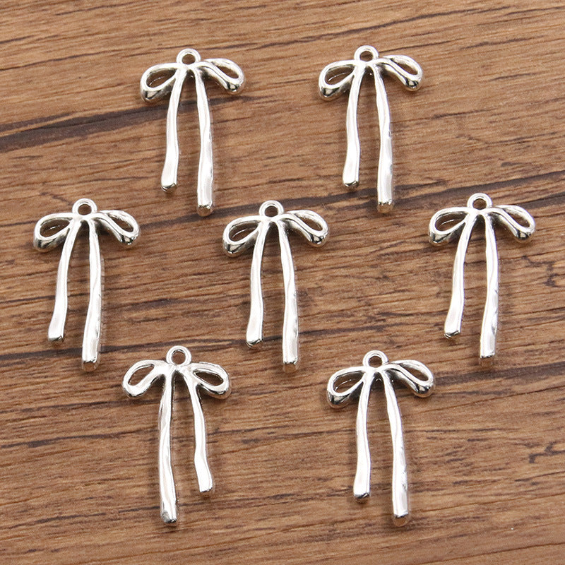 Metal Hollow Cute Bow Pendant Charms