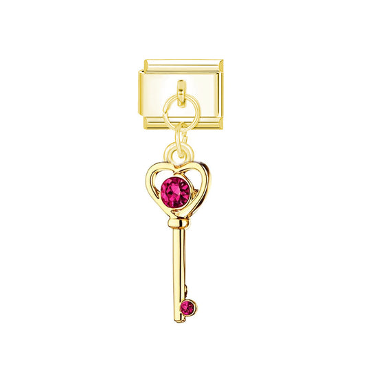 golden red key charm